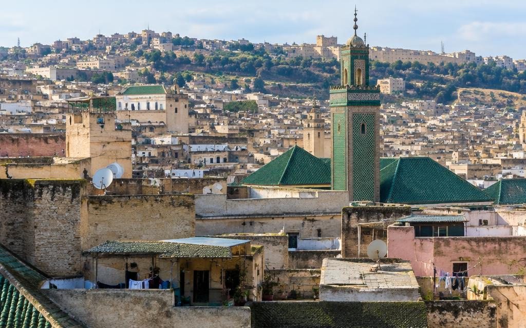 Rooftops and a minaret above the Fes medina