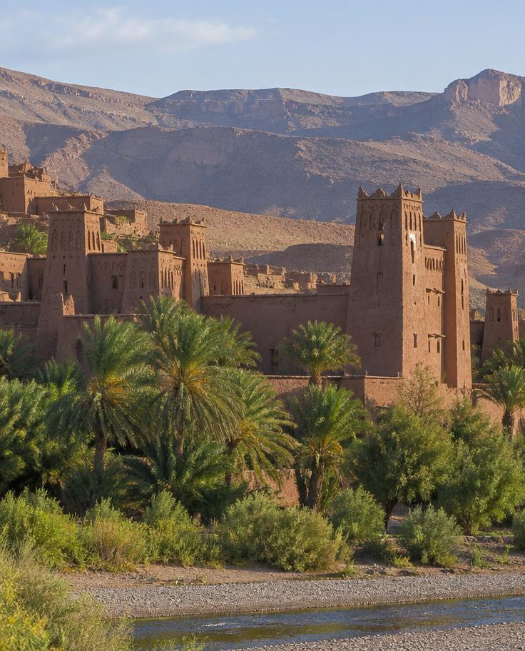 Earthen kasbah walls in a Moroccan valley